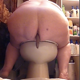 A fat, older woman takes a shit off of the side of a commode. About a minute.